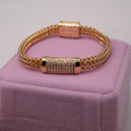 GOLD BRAIDED GEMSTONE BRACELET